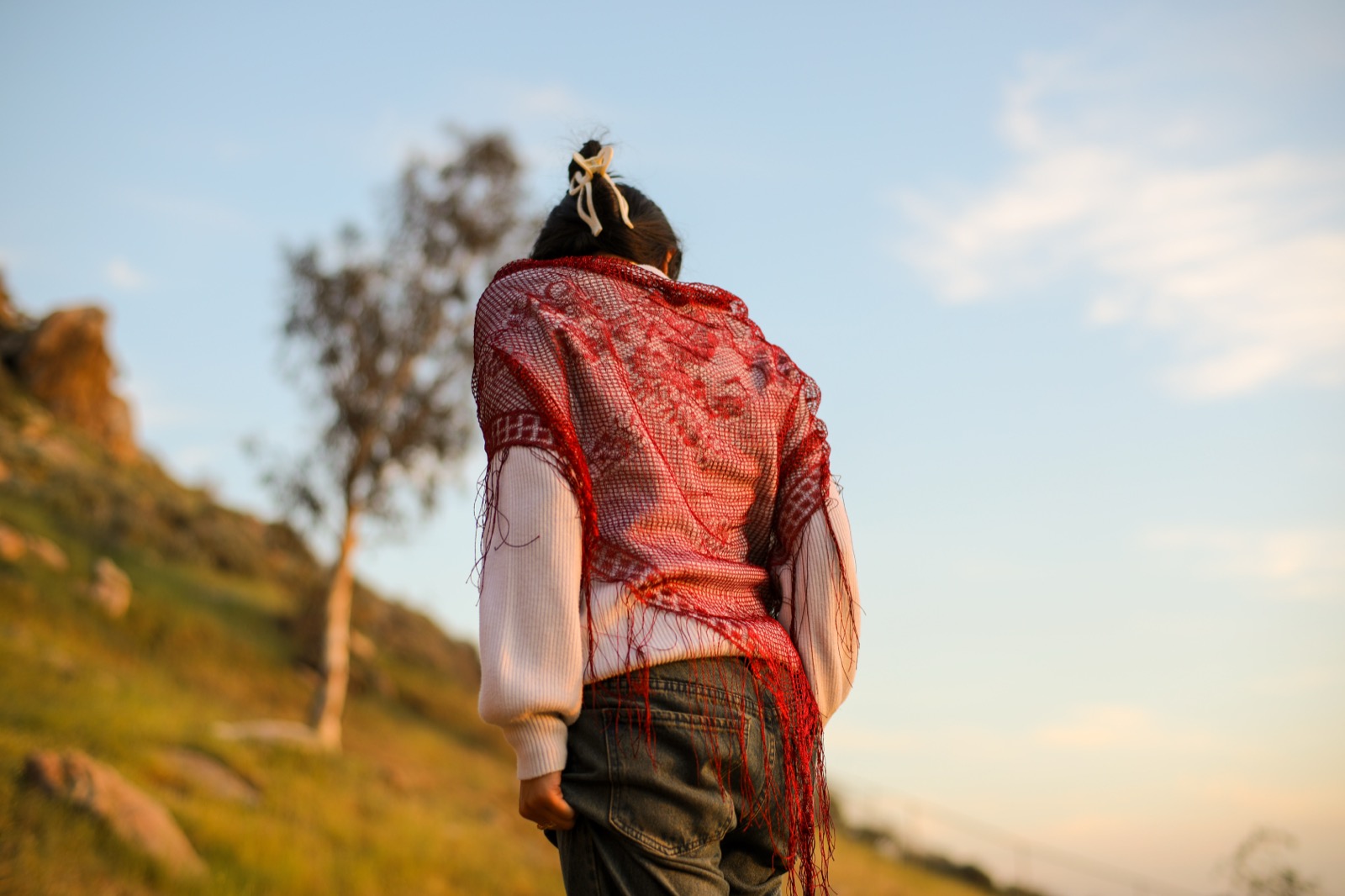 Concept shoot — walking through hillside at sunset