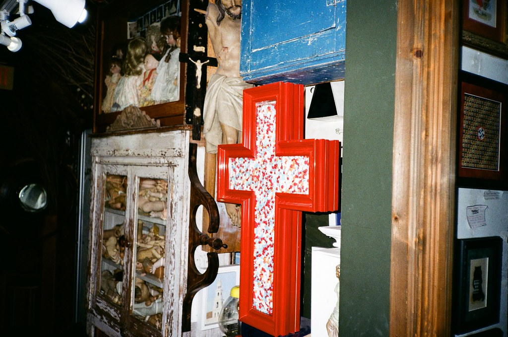 Antique shop with red cross