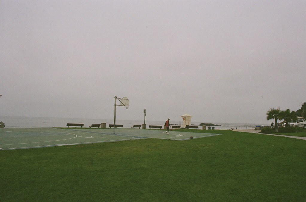 Foggy beachside basketball court
