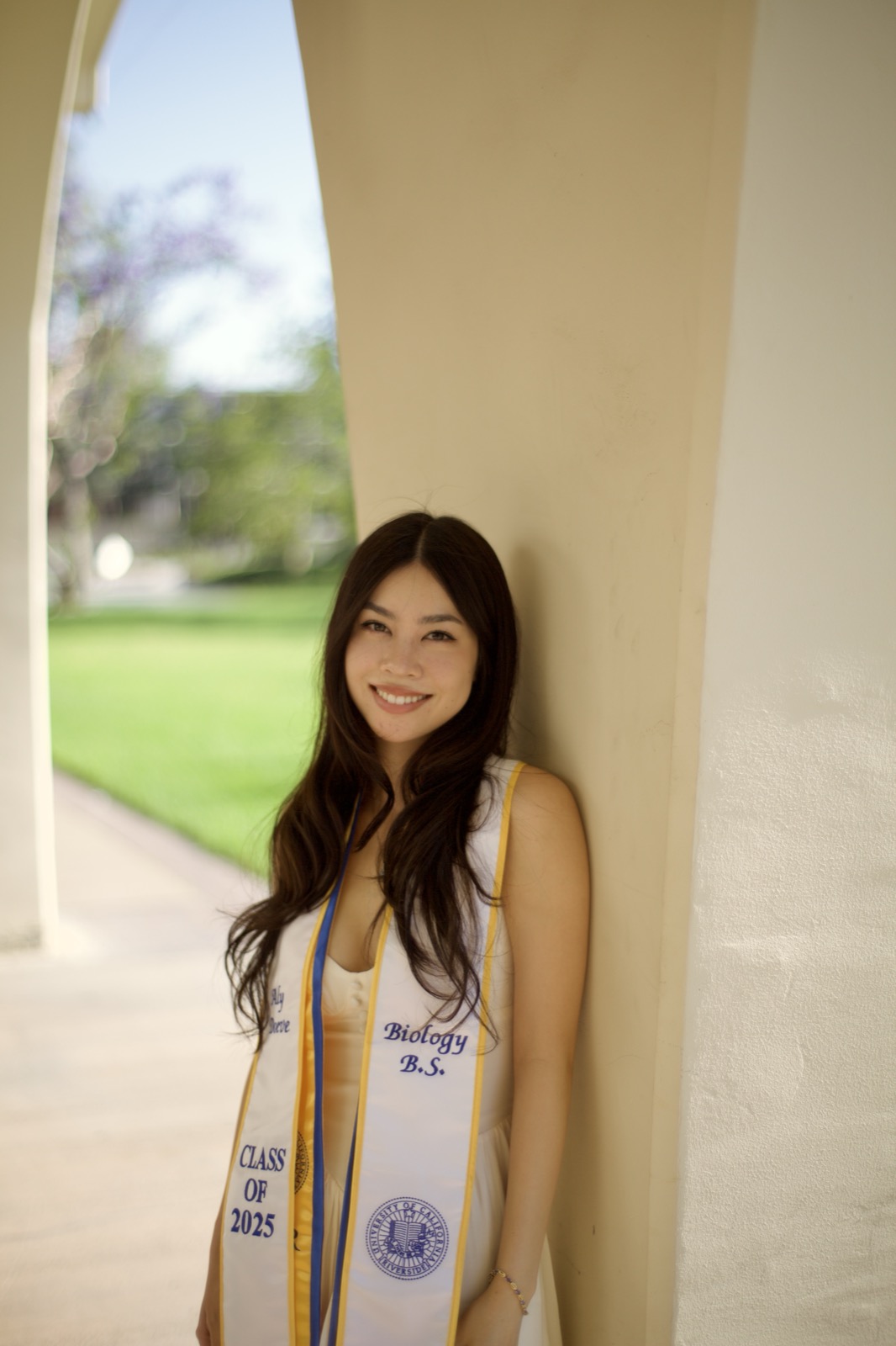 Cap toss in front of bell tower