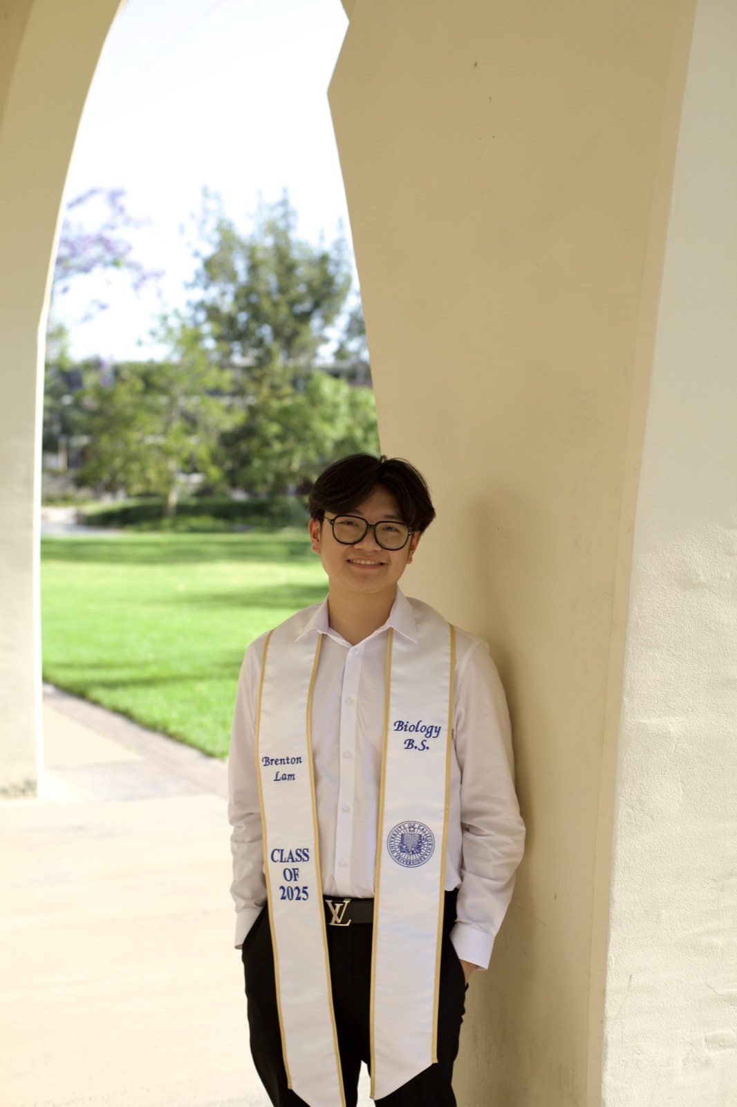 Graduate full portrait in archway
