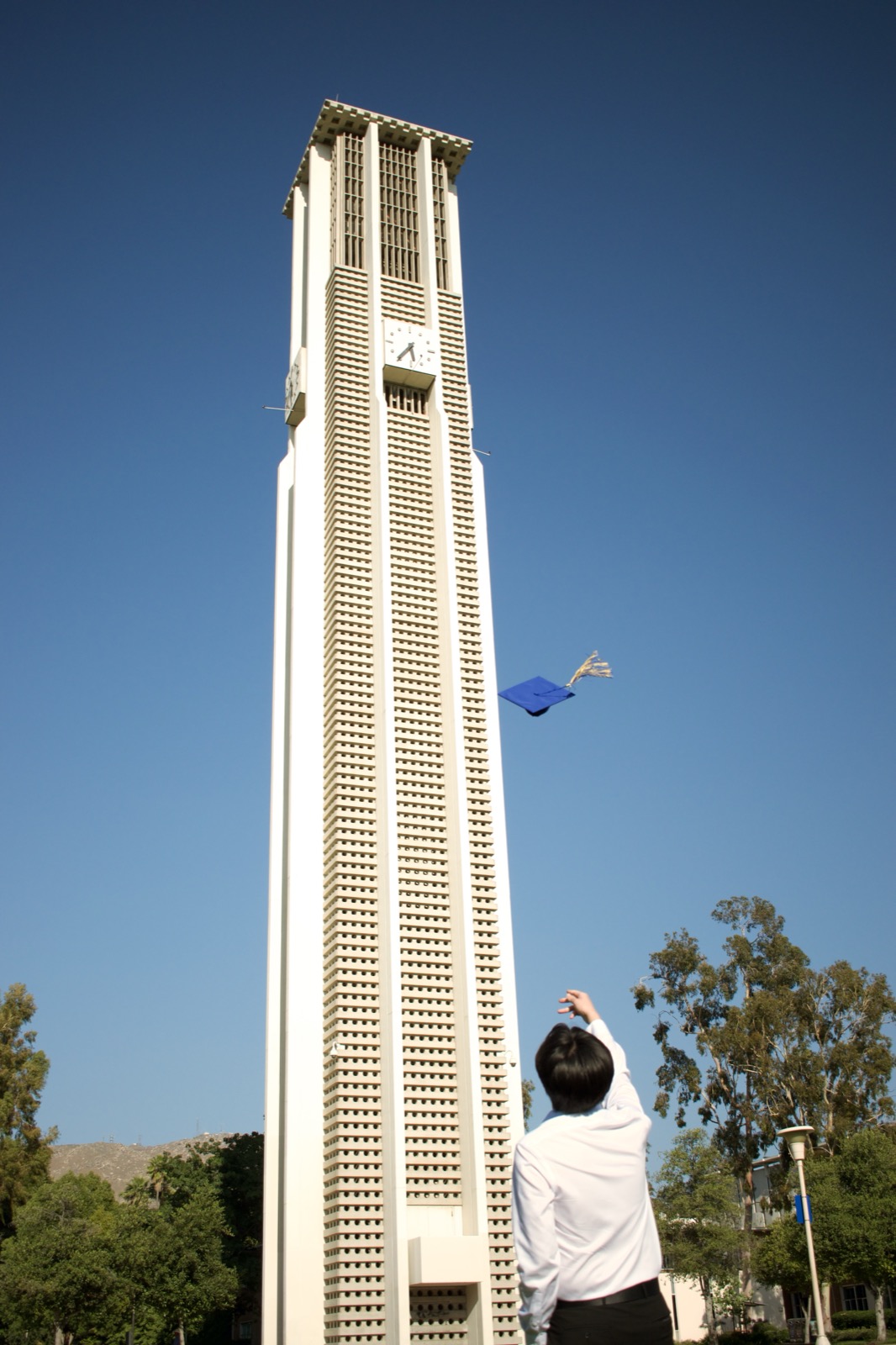 Cap toss at bell tower